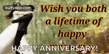 a man is holding a woman in his arms and says `` wish you both a lifetime of happy happy anniversary ! ''