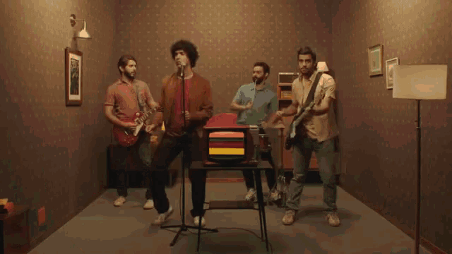a group of men playing instruments in a room