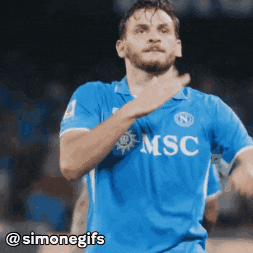 a soccer player wearing a blue shirt with msc on the front