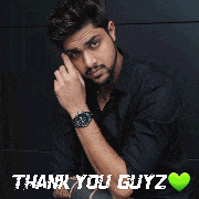 a man wearing a black shirt and a watch with the words thank you guyz