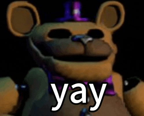 a close up of a teddy bear with the word yay on it 's face