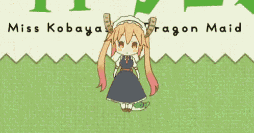 a little girl in a blue dress is standing on a green grass field .