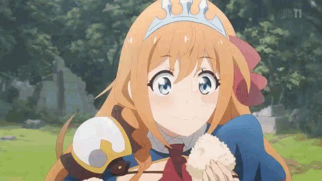 a girl with a crown on her head is holding a rice ball in her hand .