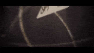 a playing card with a dragon on it is surrounded by other cards