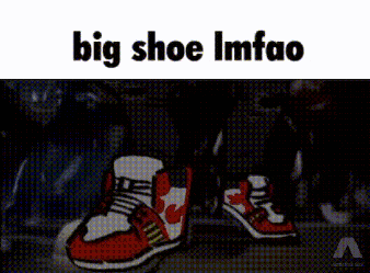 a pair of red and white sneakers with the words big shoe imfao on the bottom