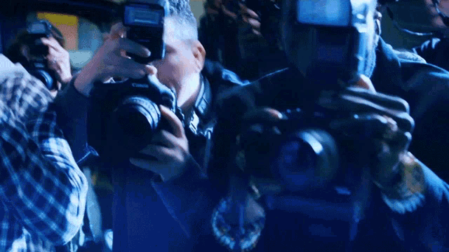 a canon camera is being used to take a photo