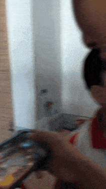 a person playing a video game with a controller