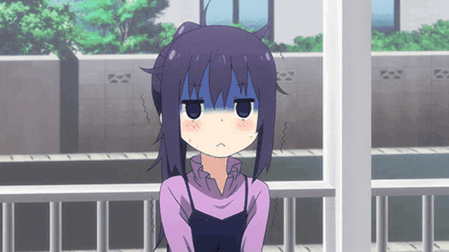 a girl with purple hair and a ponytail is making a funny face