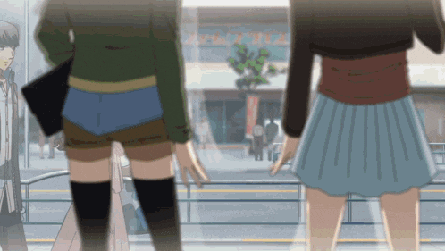 a woman in a blue skirt is standing in front of a building that says ' a ' on it