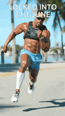 a muscular man is running down a street with the words locked into 21st june above him