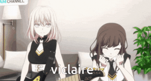a girl playing a guitar next to another girl with the word vicaire written on the bottom