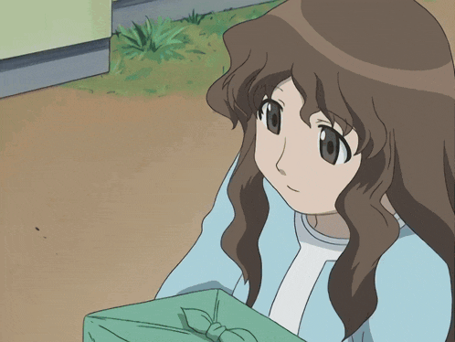 a girl with brown hair is holding a green gift box