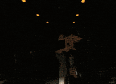 a man in a black jacket is standing in a dark room with kepler written on the bottom