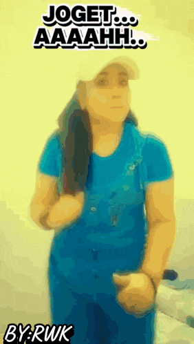 a woman wearing a blue shirt and a white hat says joget aaahhh
