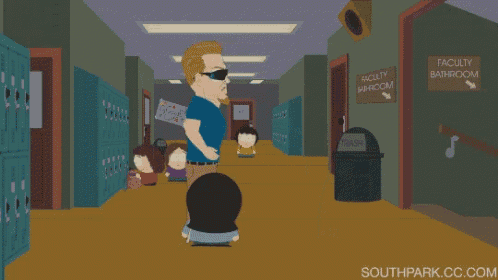 a cartoon of a man standing in a hallway with a sign that says faculty bathroom