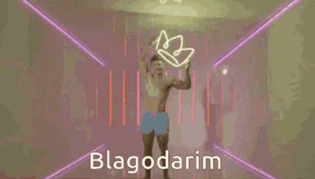 a shirtless man is holding up a neon sign that says blagodarim