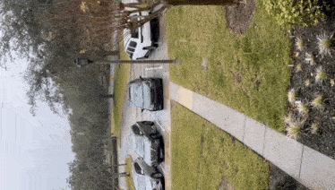 several cars are parked on the side of the road
