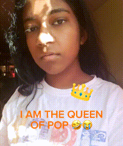 a girl is wearing a white shirt that says " i am the queen of pop "