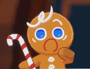 a gingerbread man is holding a candy cane and has a surprised look on his face