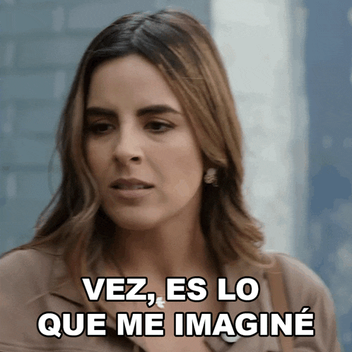 a woman says " vez es lo que me imagine " in front of her face