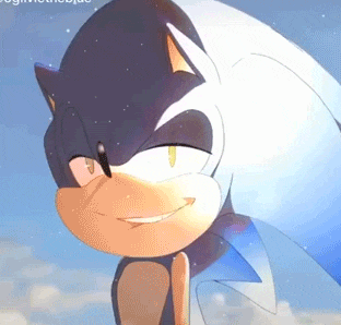 a close up of a cartoon character , sonic the hedgehog , smiling at the camera .
