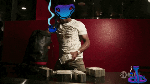 a man with a snake on his head sits in front of stacks of money and a showtime logo