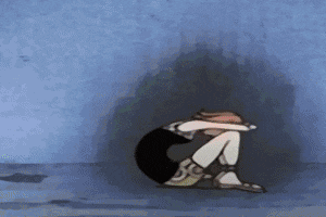 a cartoon of a person sitting on the ground with their head down