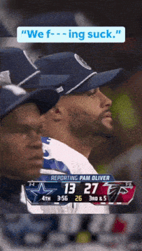 a cowboys player sitting in the stands watching a game