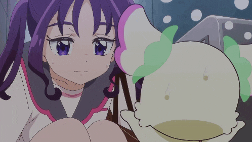 a girl with purple hair and blue eyes looks at a cartoon character