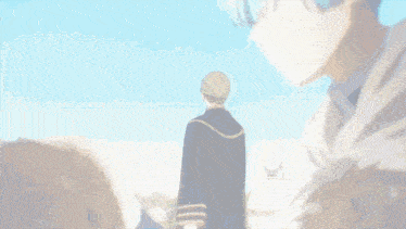 a man in a black robe stands in front of a group of people