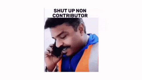 a man with a mustache is talking on a cell phone while wearing an orange vest .