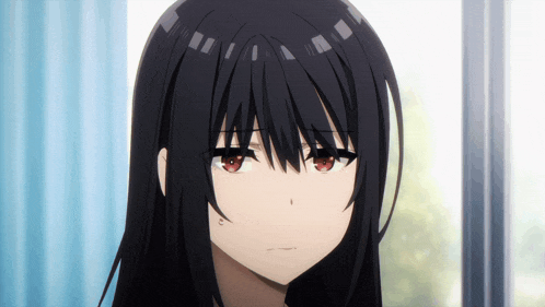 a close up of a girl 's face with long black hair