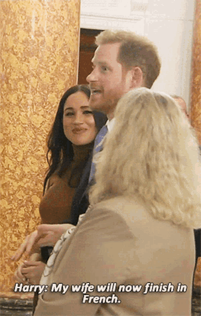 harry and meghan are standing next to each other and harry says " my wife will now finish in french "