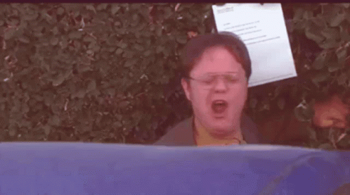 Dwight Schrute The Office GIF - Dwight Schrute The Office Tongue Wiggle GIFs