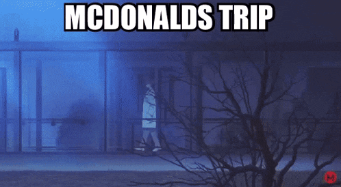 a person walking into a building with the words mcdonalds trip on the bottom