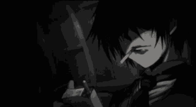 a black and white photo of a person smoking a cigarette in a dark room .