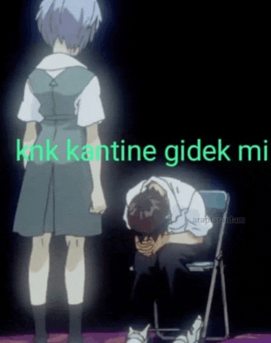 a girl in a school uniform is standing next to a boy in a chair with his head in his hands .