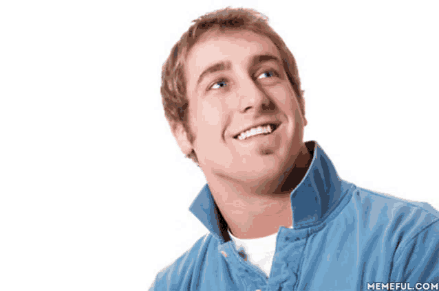 a man wearing a blue shirt is smiling and looking up at the memeful.com website