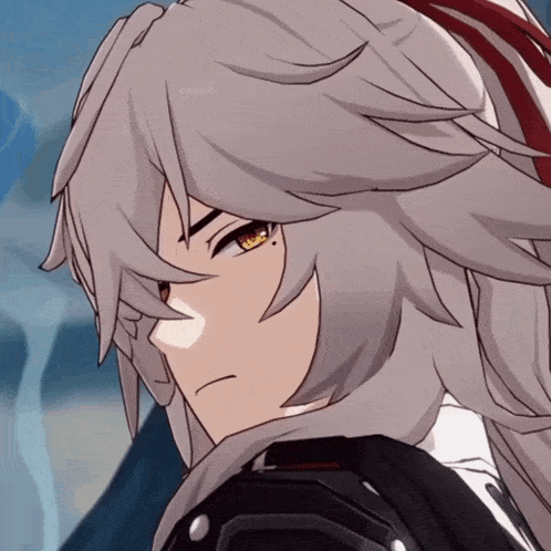 a close up of a person 's face with long white hair