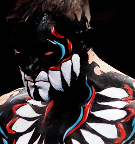 a close up of a person 's face and body paint