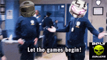 two police officers are standing next to each other and the words let the games begin