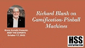 a man is standing in front of an orange background with the words richard blank on gamification-pinball machines written on it .