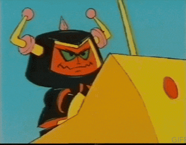 a cartoon character with horns is sitting on top of a yellow box .