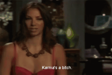 a woman in a red bra and necklace is talking about karma 's a bitch .