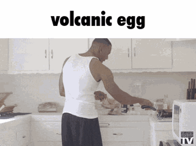 a man in a white tank top is cooking in a kitchen with the words volcanic egg above him