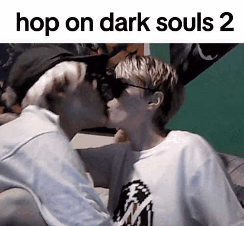 two men kissing with the words hop on dark souls 2 below them
