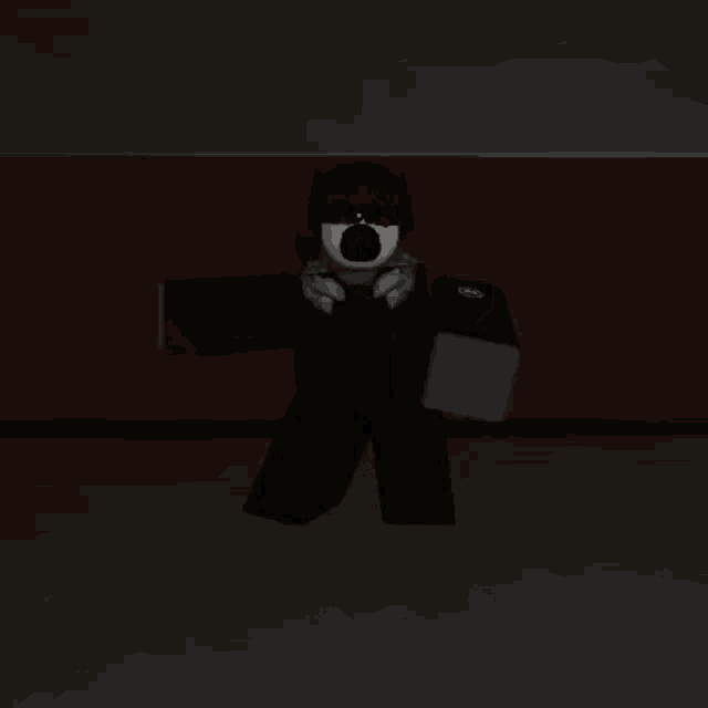 a black and white cartoon character is standing in the dark in a room .