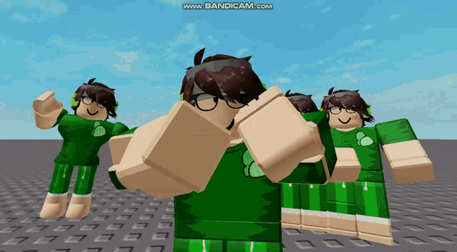 a group of green roblox characters are dancing together