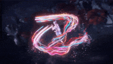 a person is surrounded by a glowing swirl of colorful lights