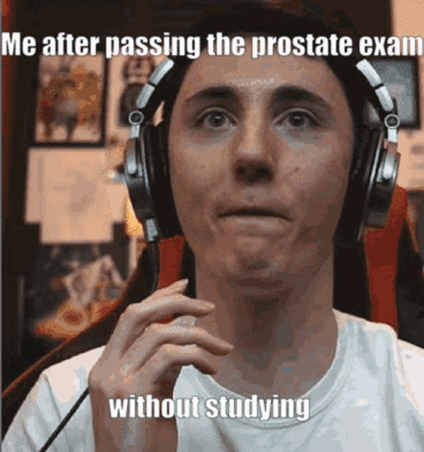 a man wearing headphones is making a funny face and the caption says me after passing the prostate exam without studying
